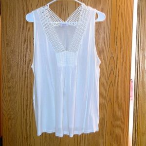 White sleeveless top
